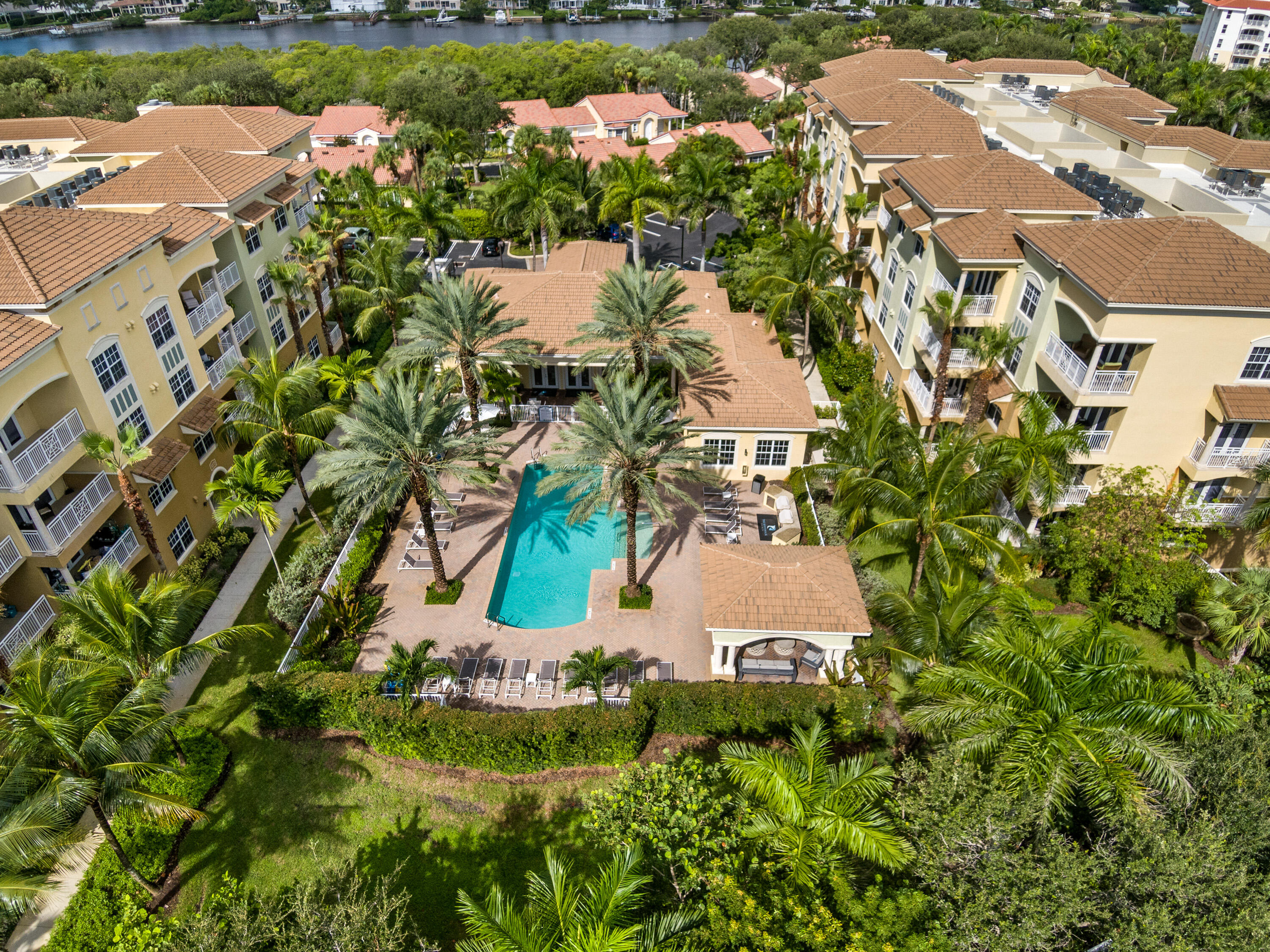 an aerial view of residential house with outdoor space and swimming pool