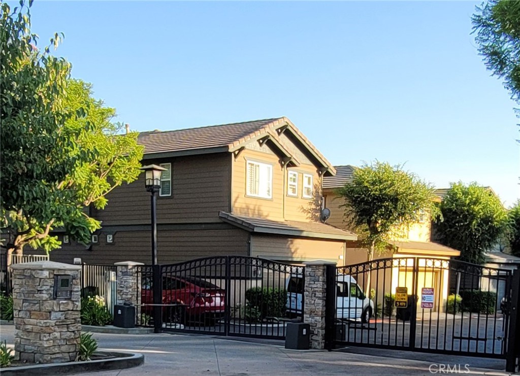 a front view of a house with garage