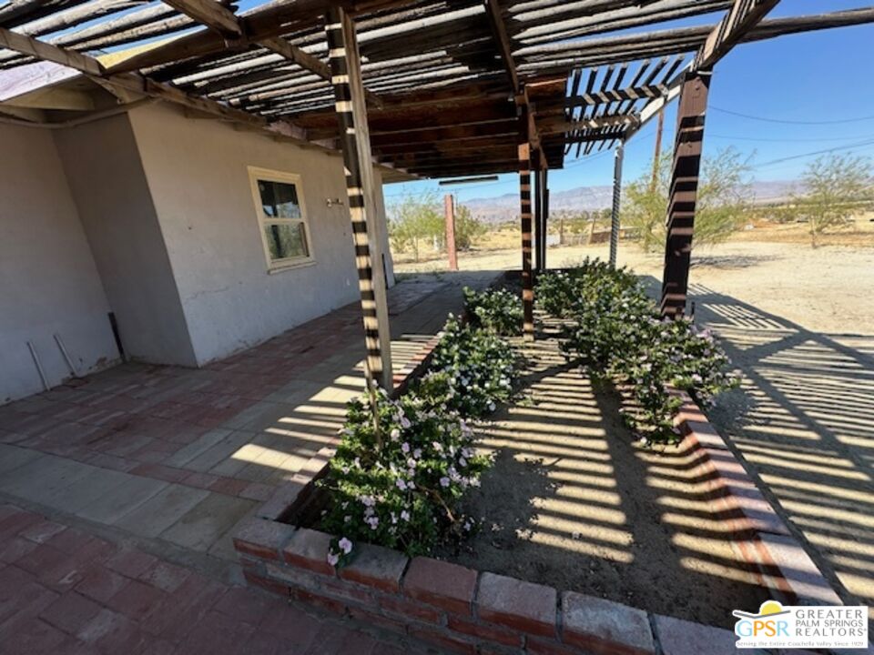 a balcony with wooden floor