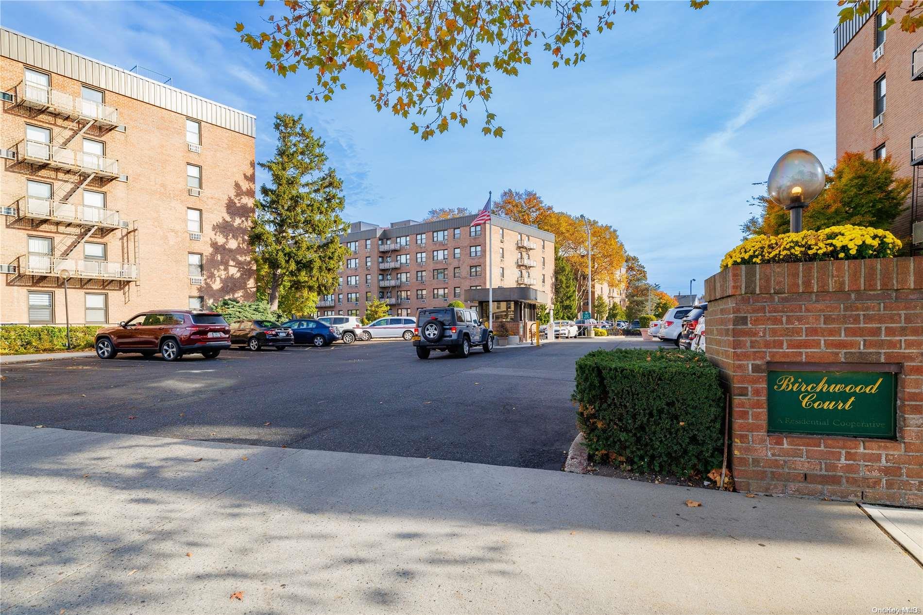 a cars parked in front of a building