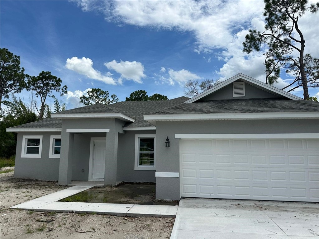 front view of a house with a yard