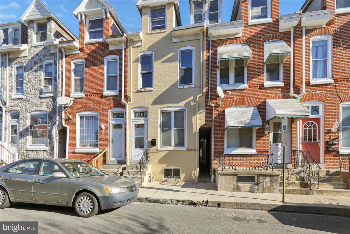 a car parked in front of a building