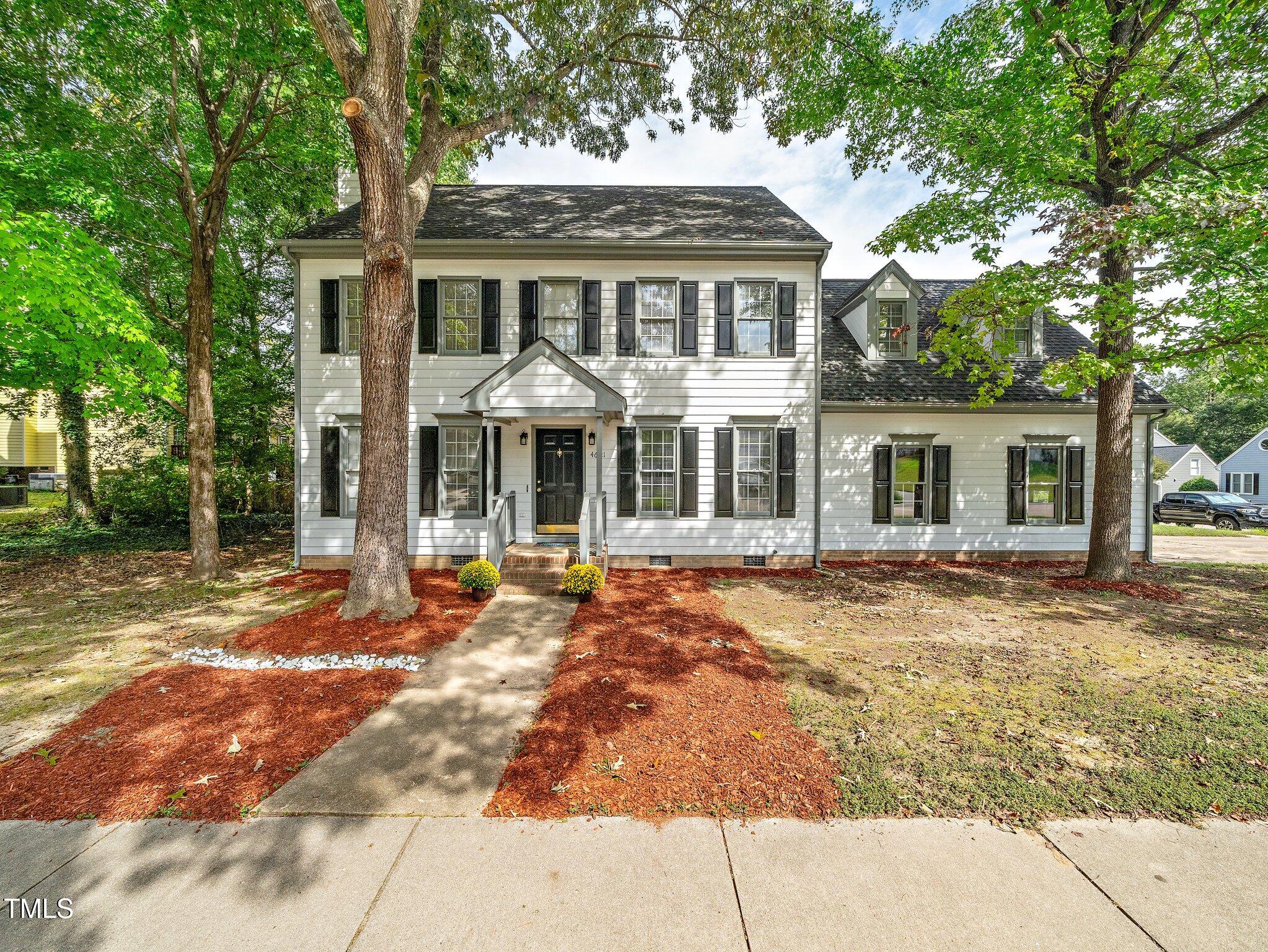 front view of a house with a patio