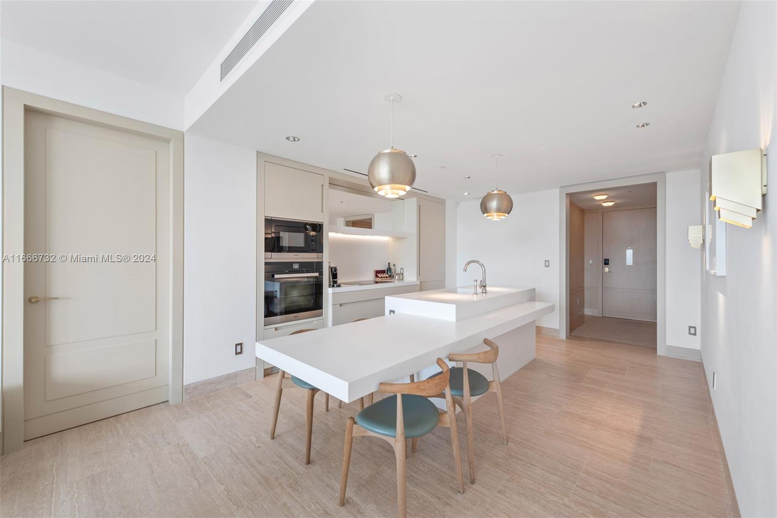 a view of a dining room kitchen and a window