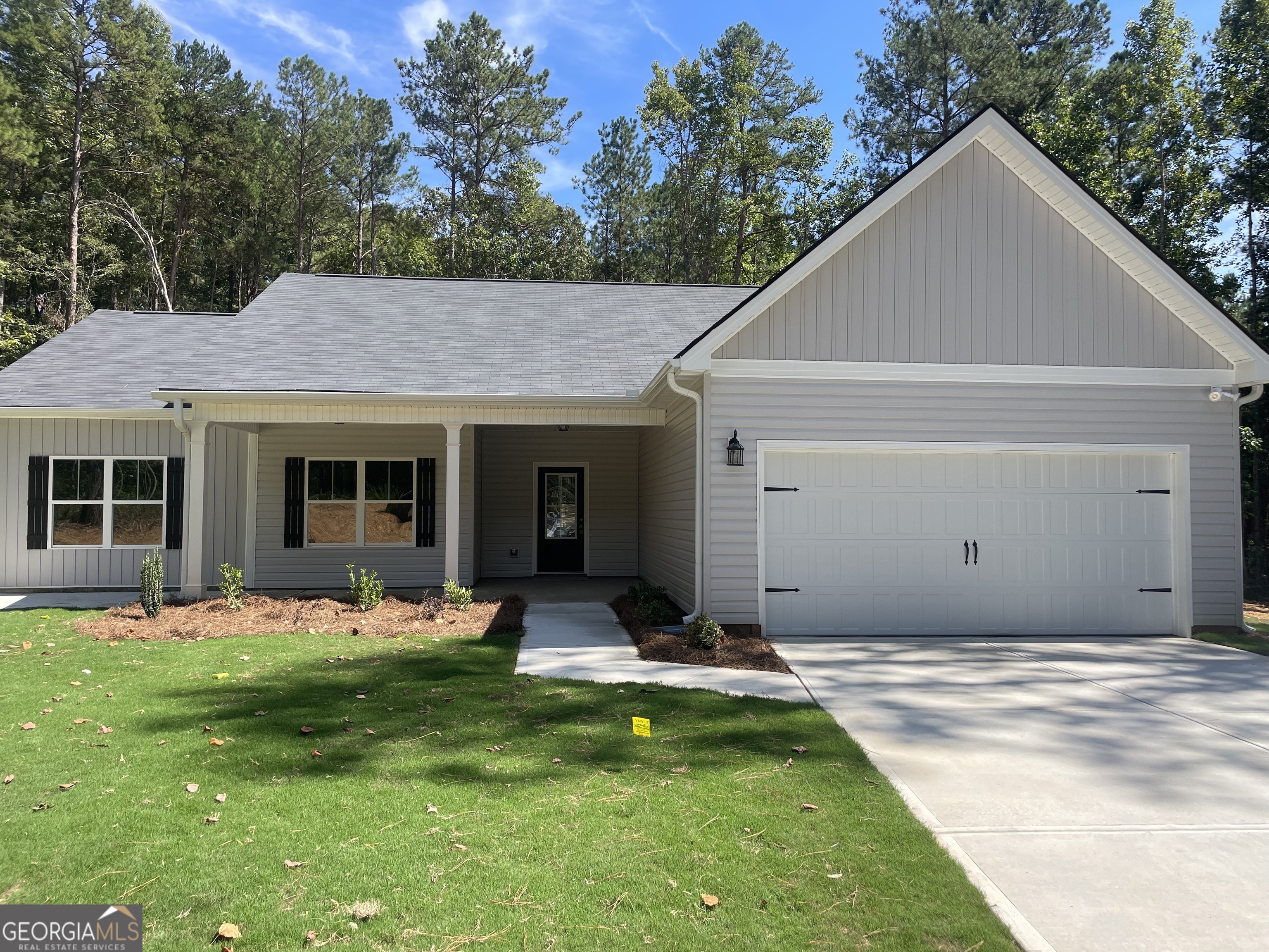 a front view of house with yard