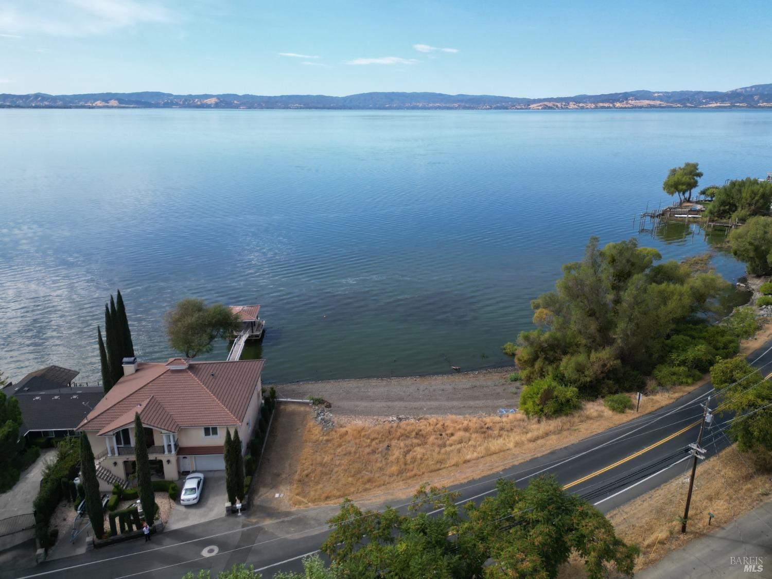 a house view with a lake view