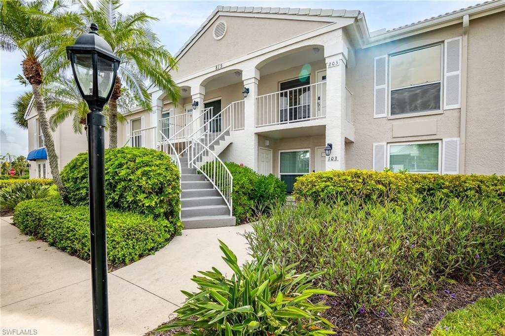 View of front of home featuring a balcony