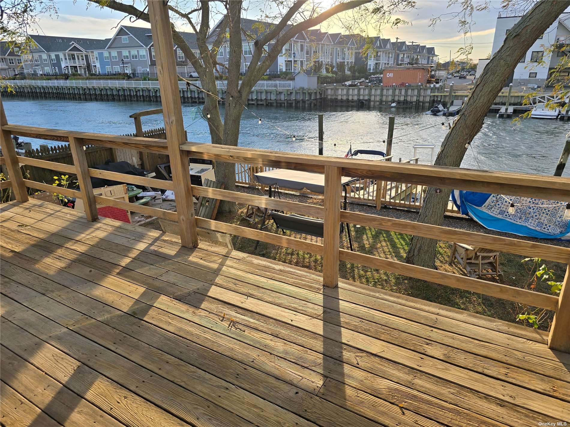 a view of a street with sitting area