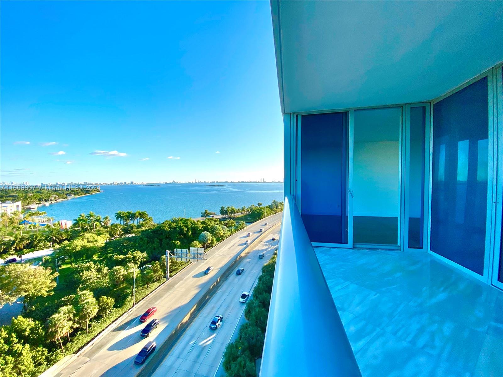 a view of a balcony with an ocean