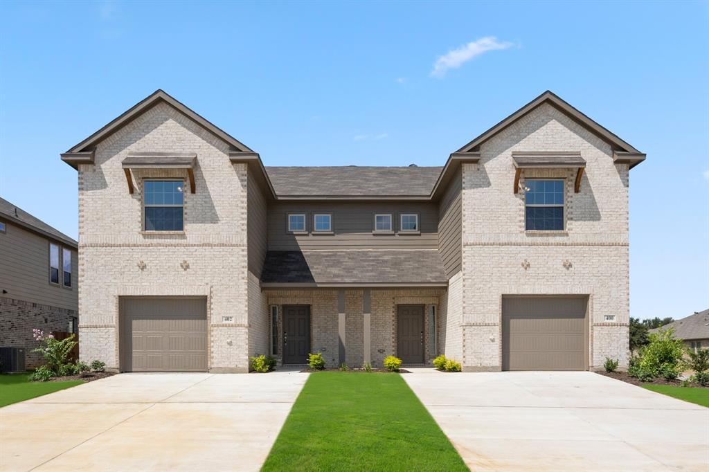 a front view of a house with yard and front view of a house