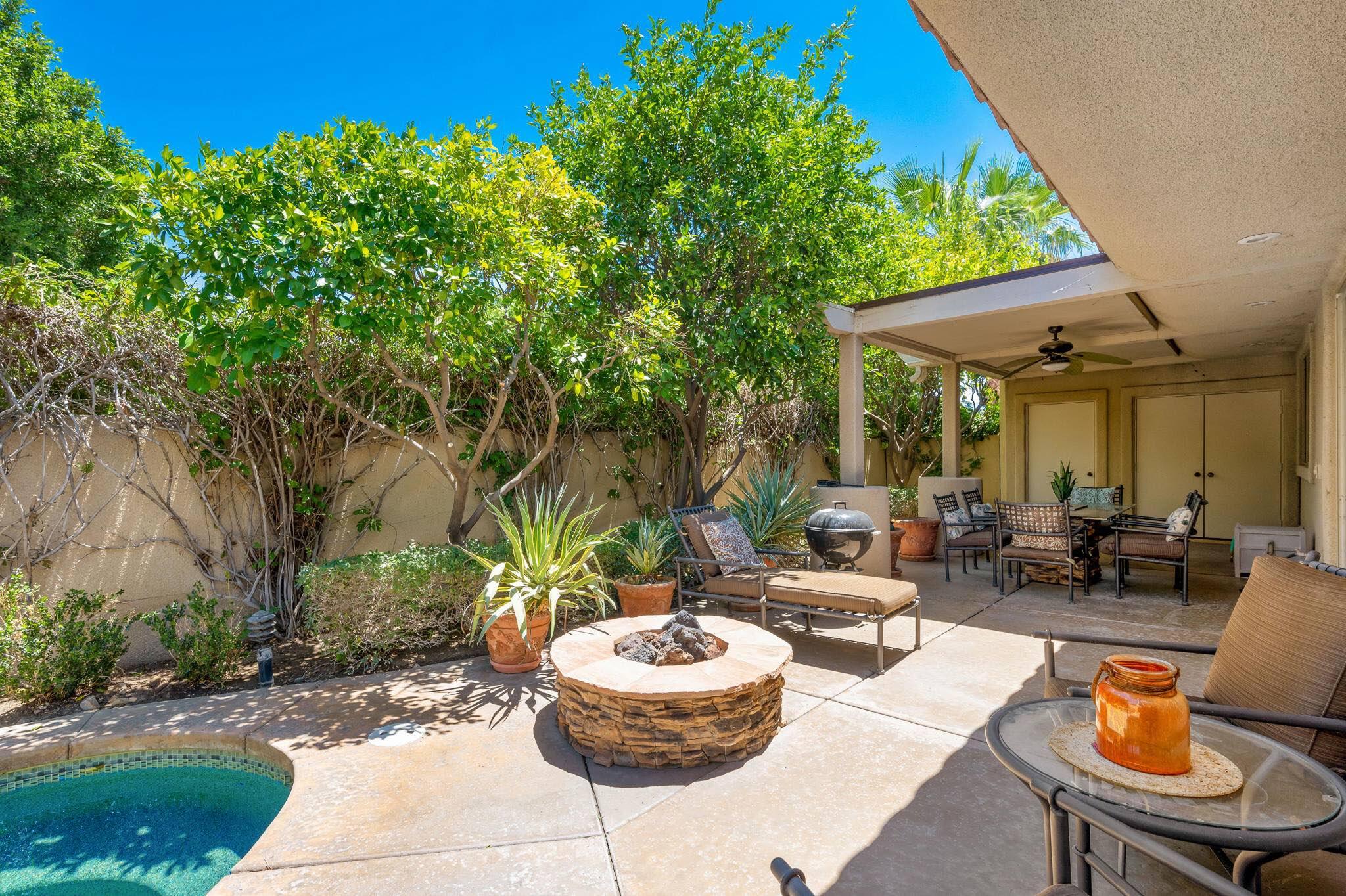 a outdoor living space with furniture and garden