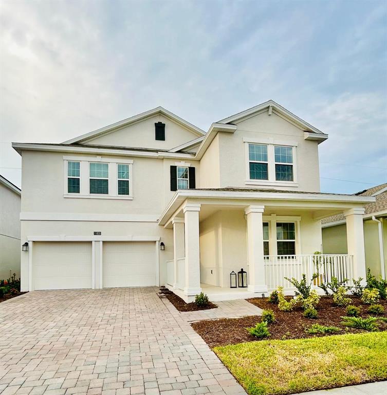 a front view of a house with yard