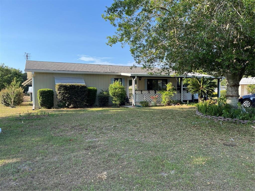 front view of house with a yard