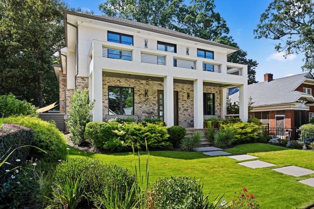 front view of a house with a yard