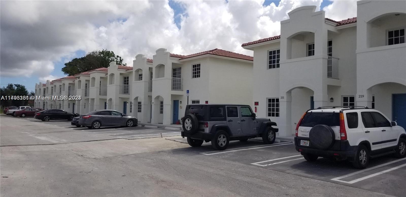 a car parked in front of a house