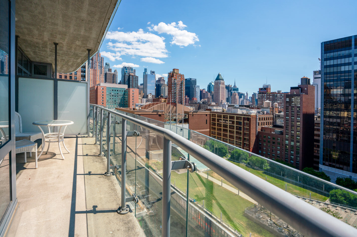 a view of a balcony with city view