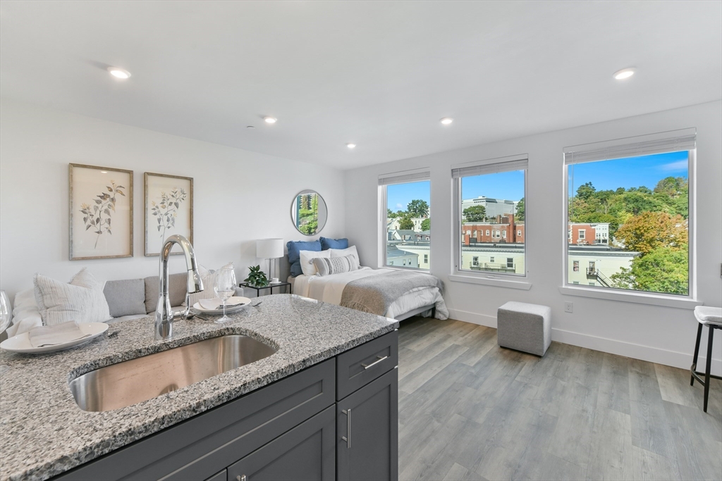 a kitchen with granite countertop lots of counter top space