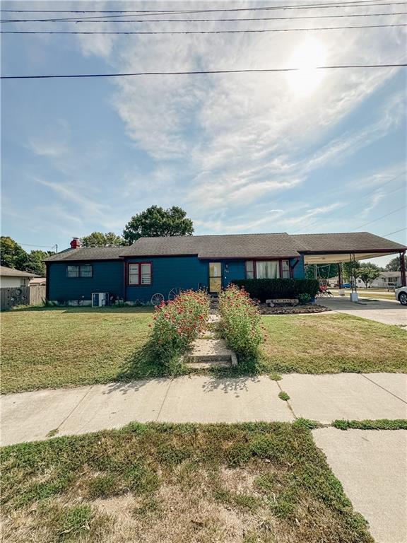 a front view of house with yard