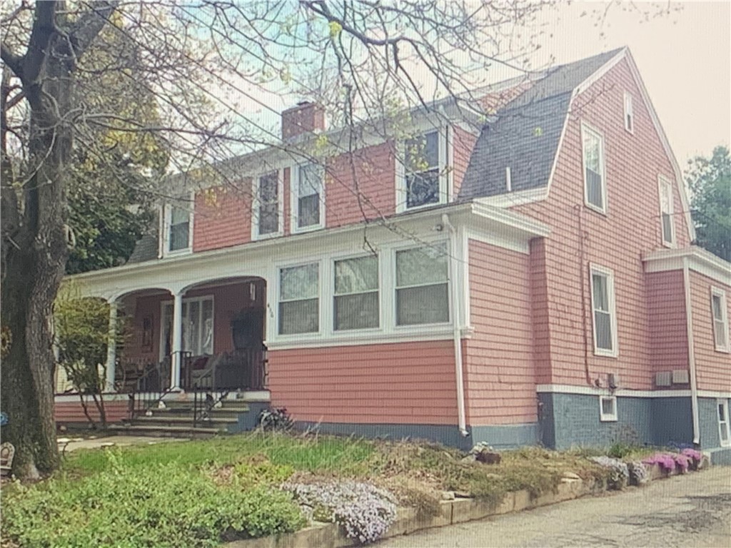 Beautiful two Family with  Finished Walk-Out Basement.