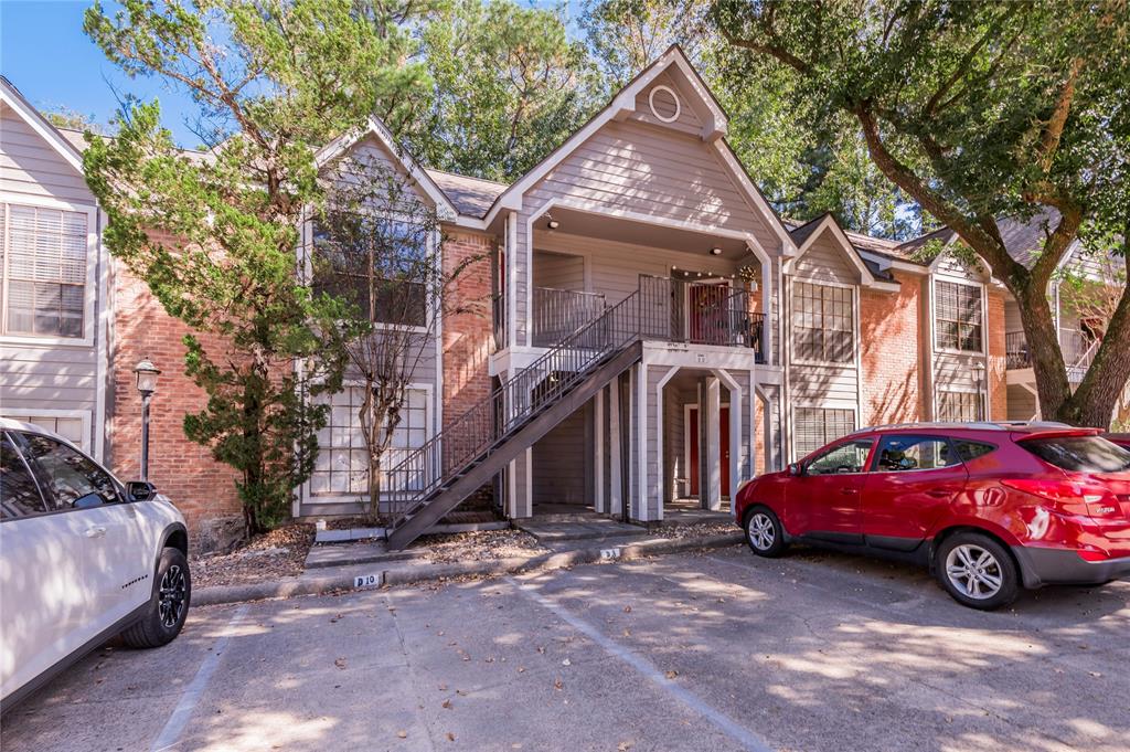 a car parked in front of a house