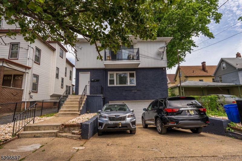 a car parked in front of a house