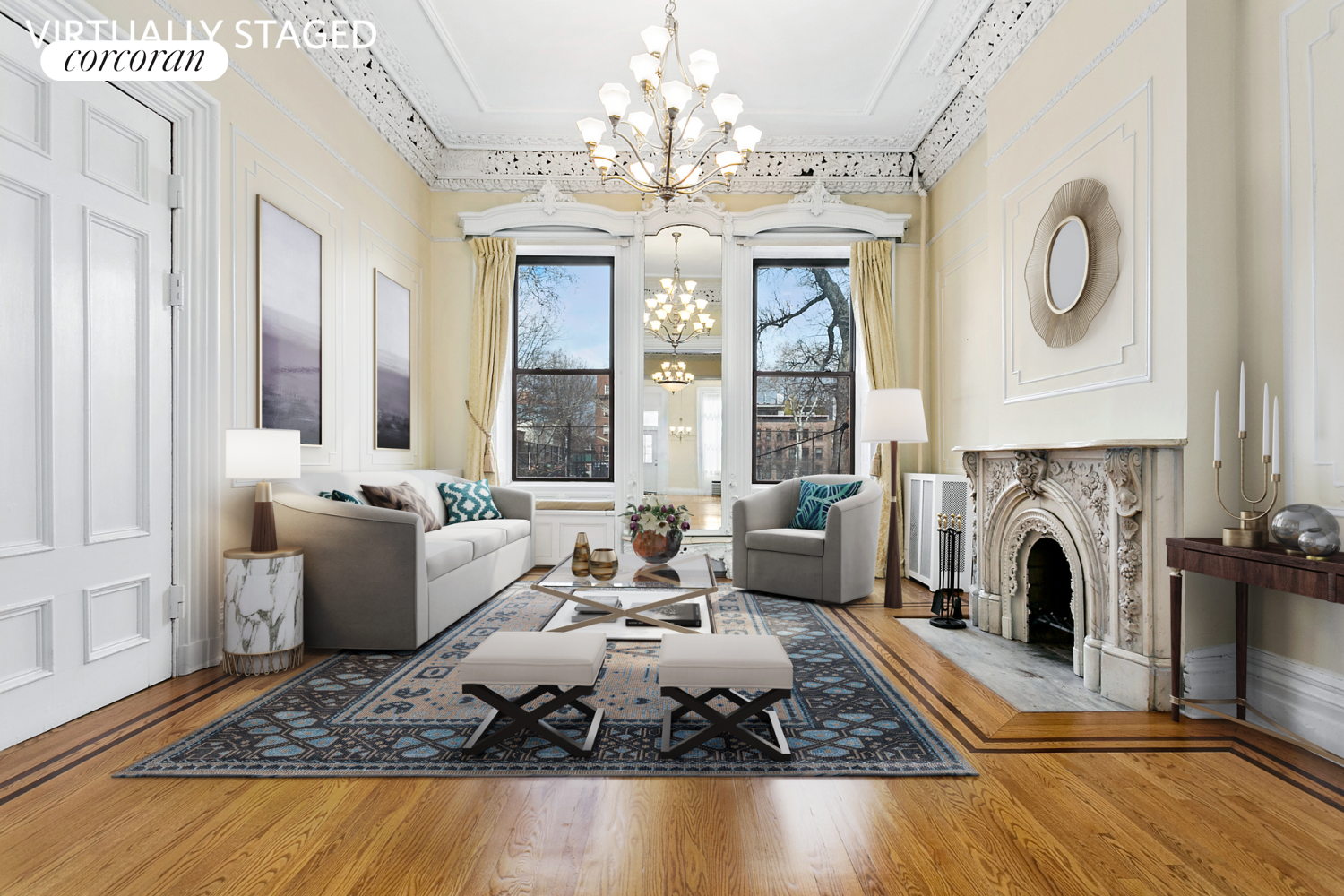 a living room with fireplace furniture and a chandelier