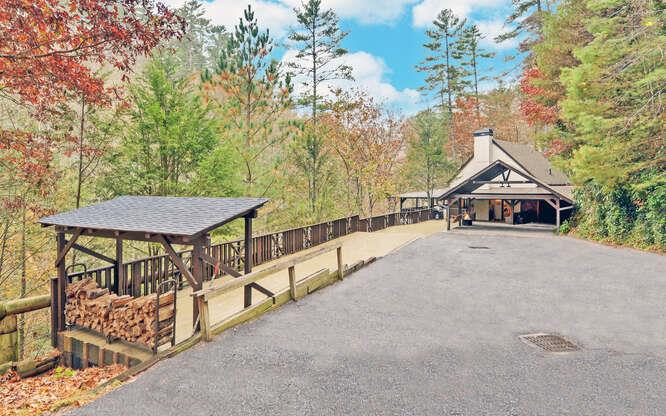 a view of house with a yard and sitting area