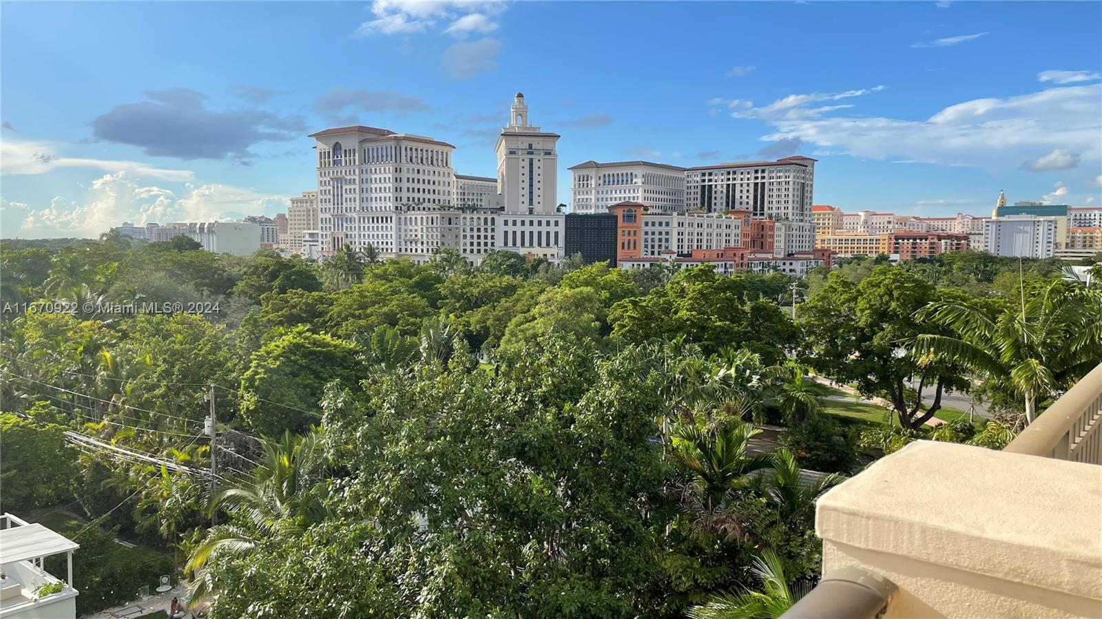 a view of a city with tall buildings