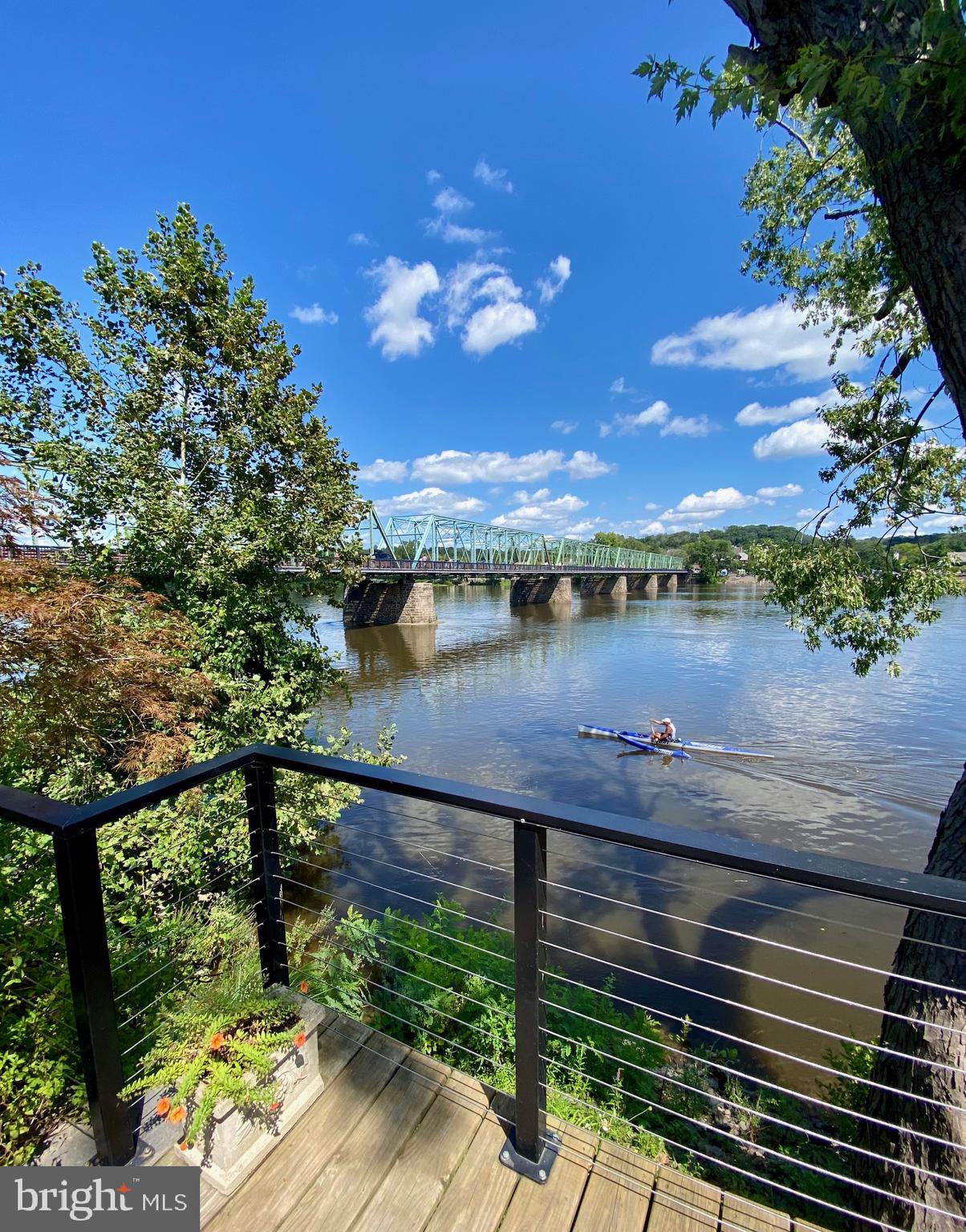 a view of a lake from a balcony