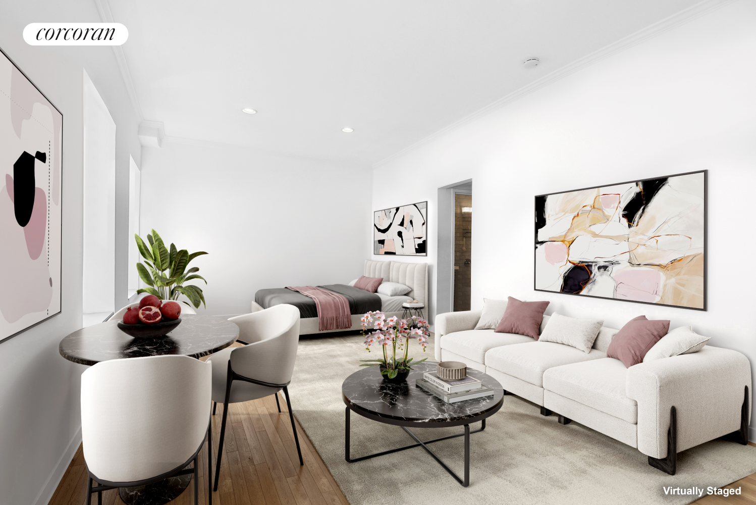 a living room with furniture a rug and a potted plant