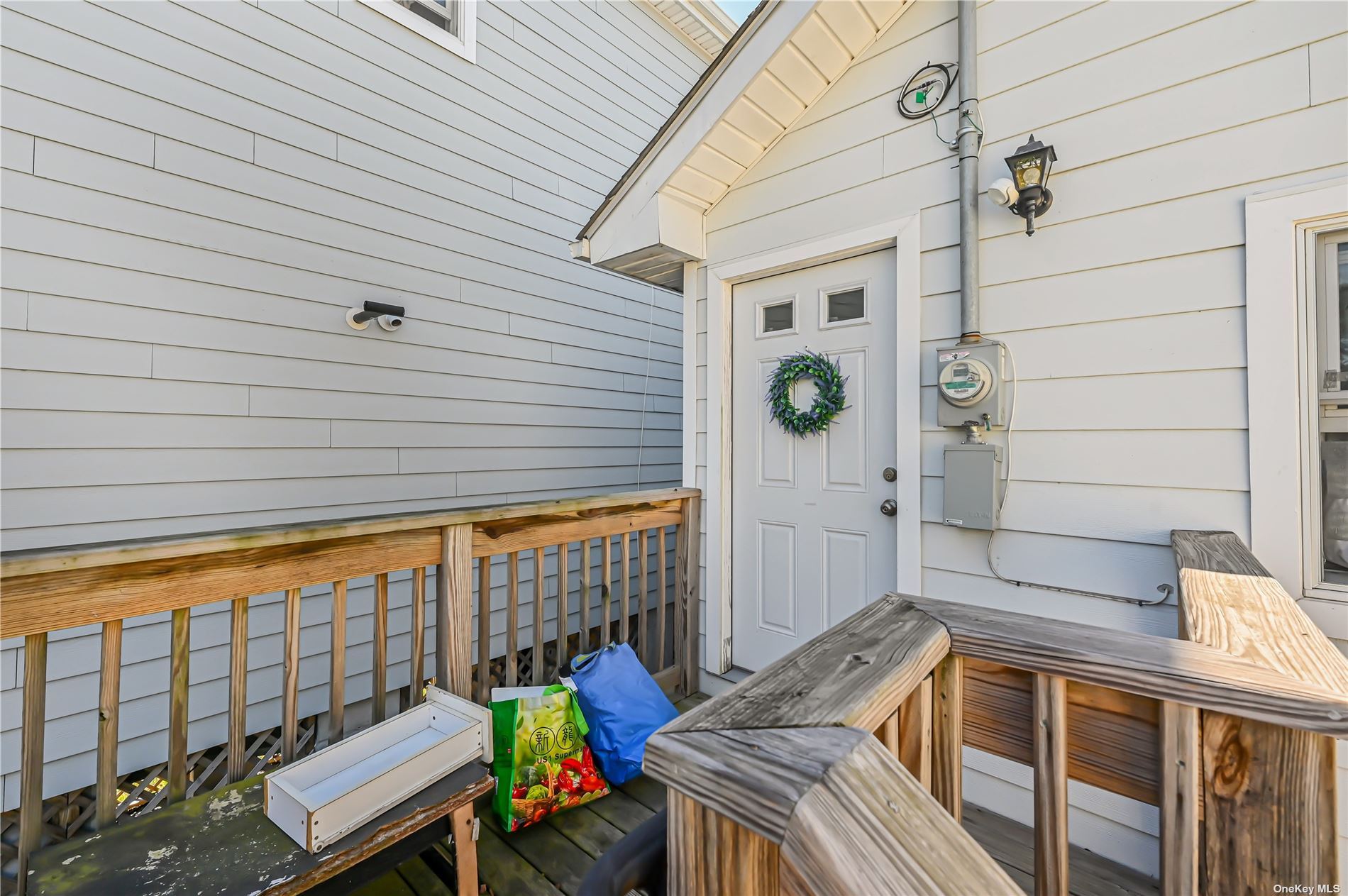 a balcony view with a seating space