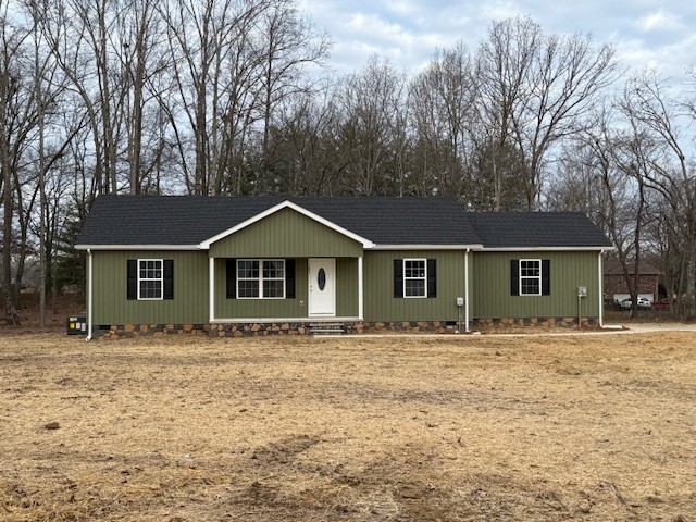 a front view of a house with yard