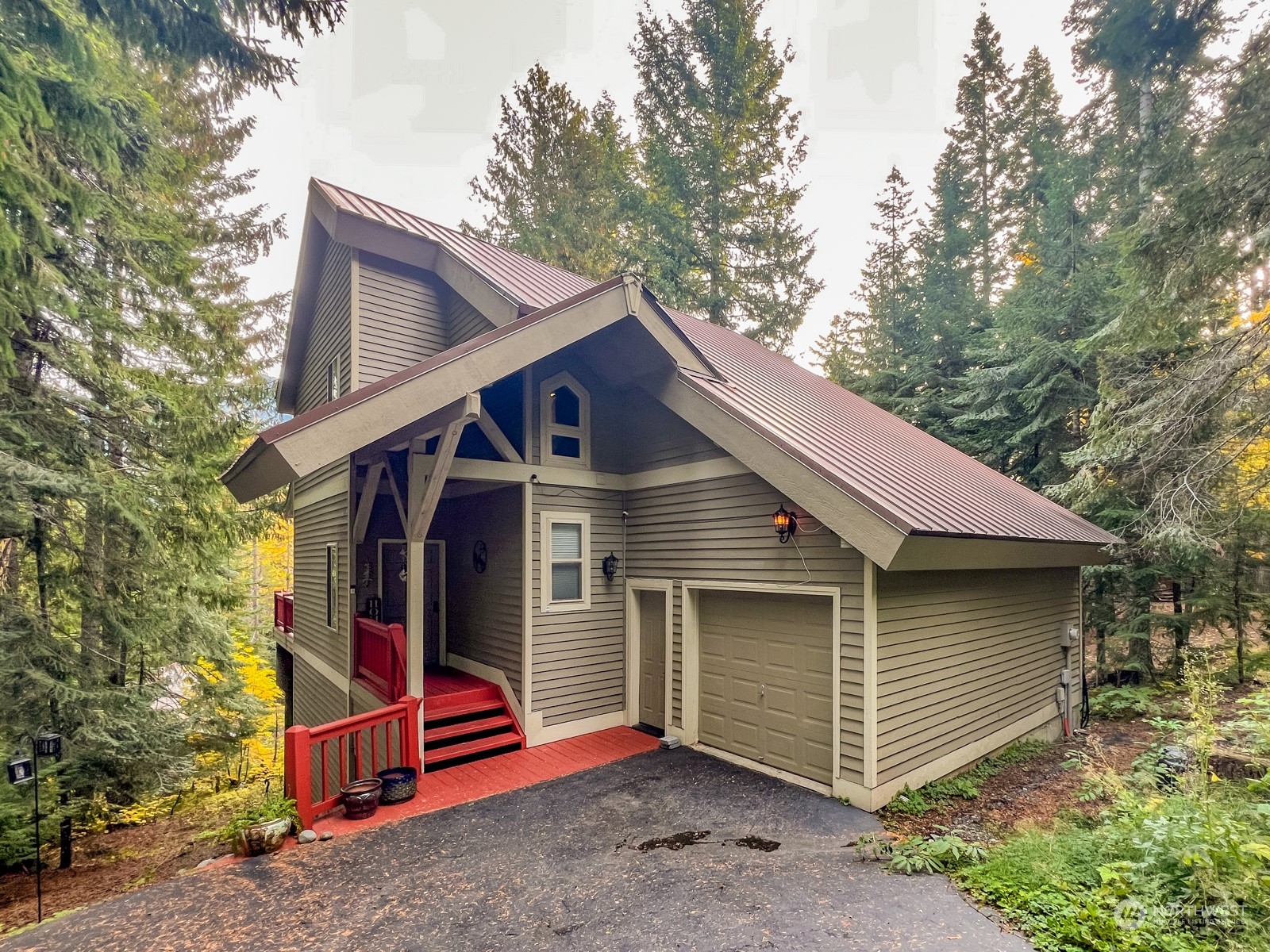 a front view of a house with a garage