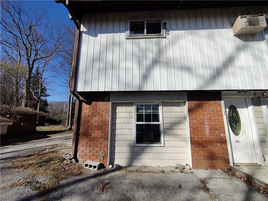 a front view of a house with parking