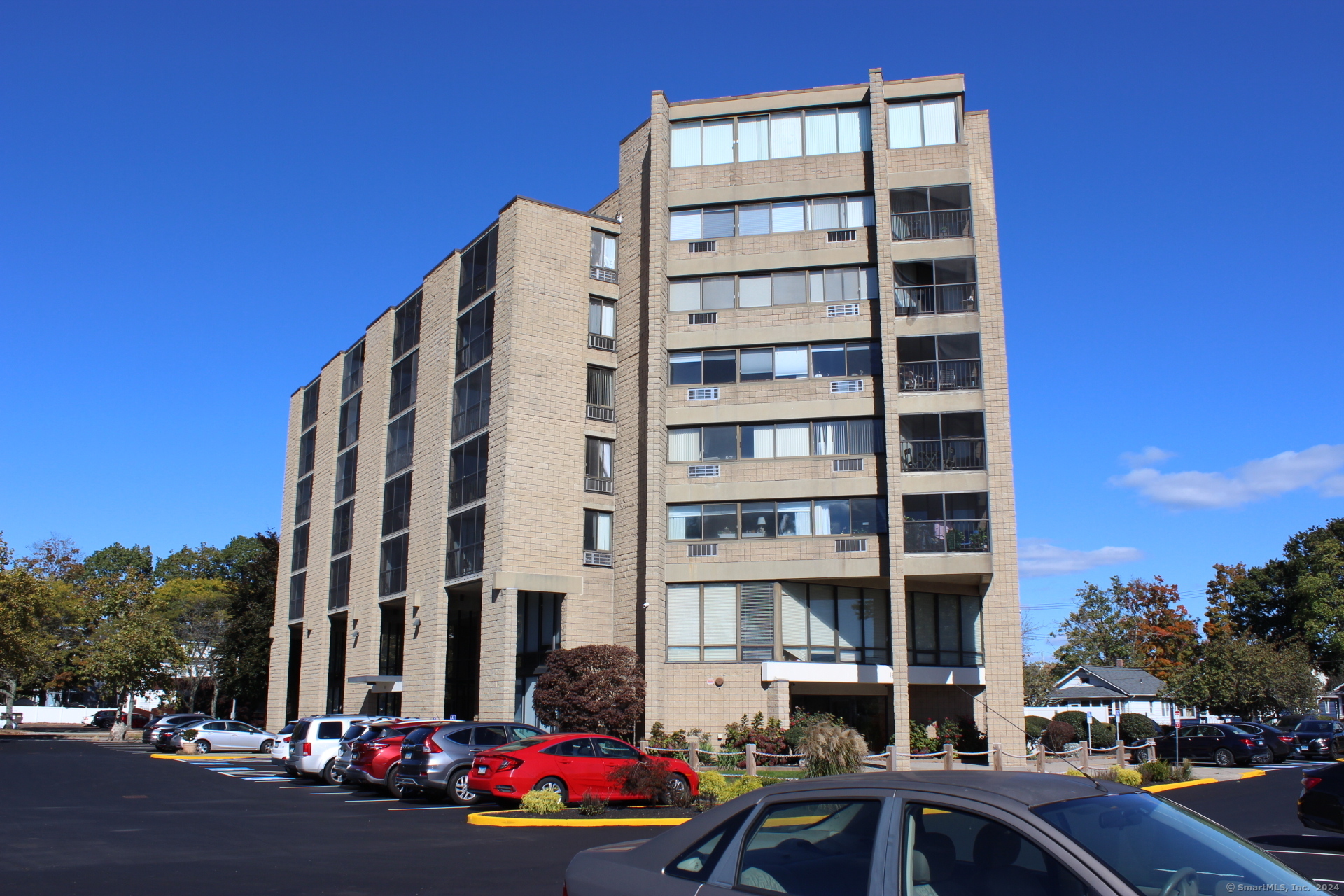 a front view of a building with street view