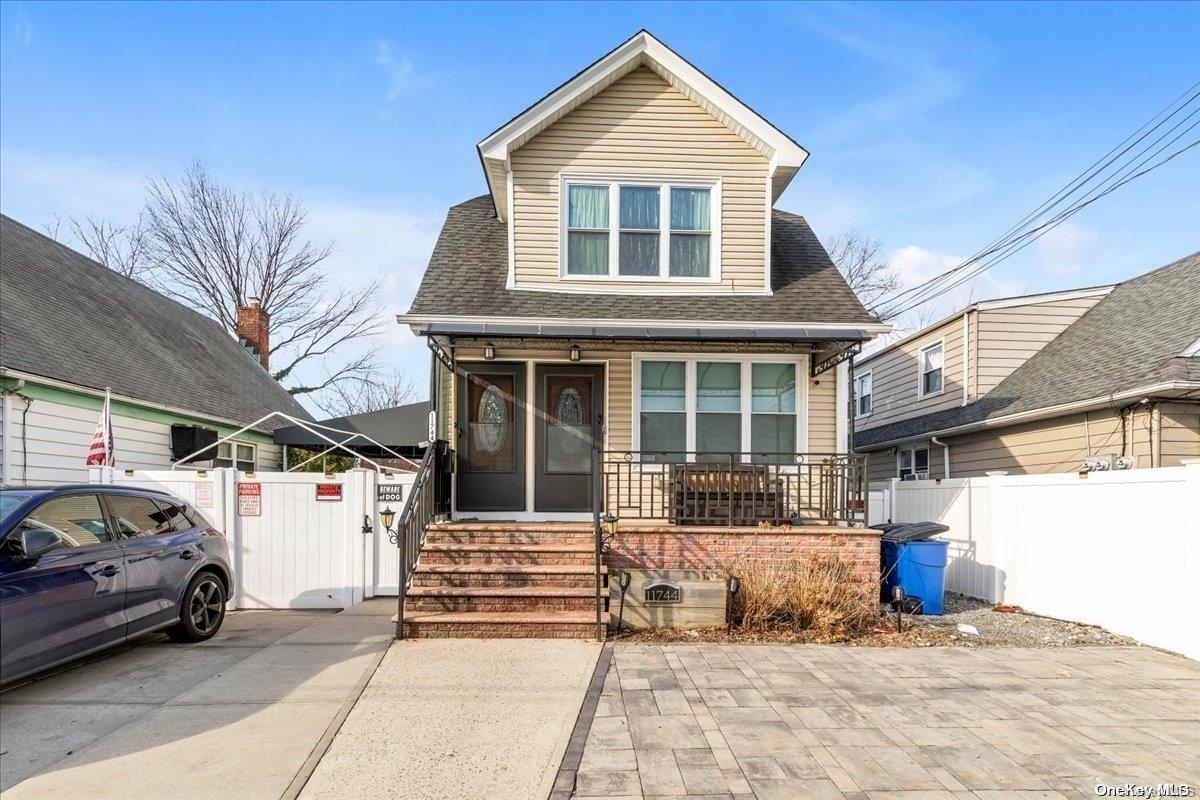 a front view of a house with a outdoor space