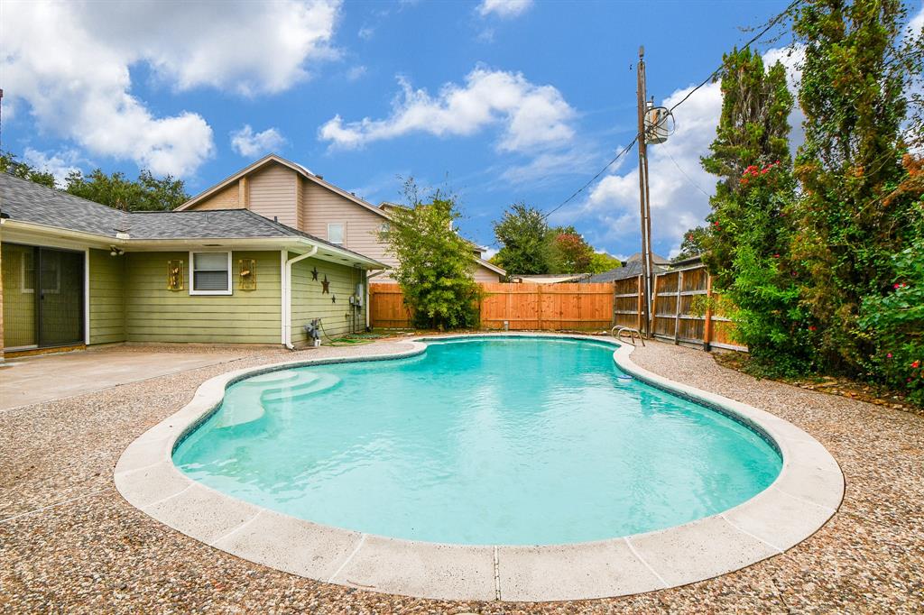 a view of outdoor space yard and swimming pool