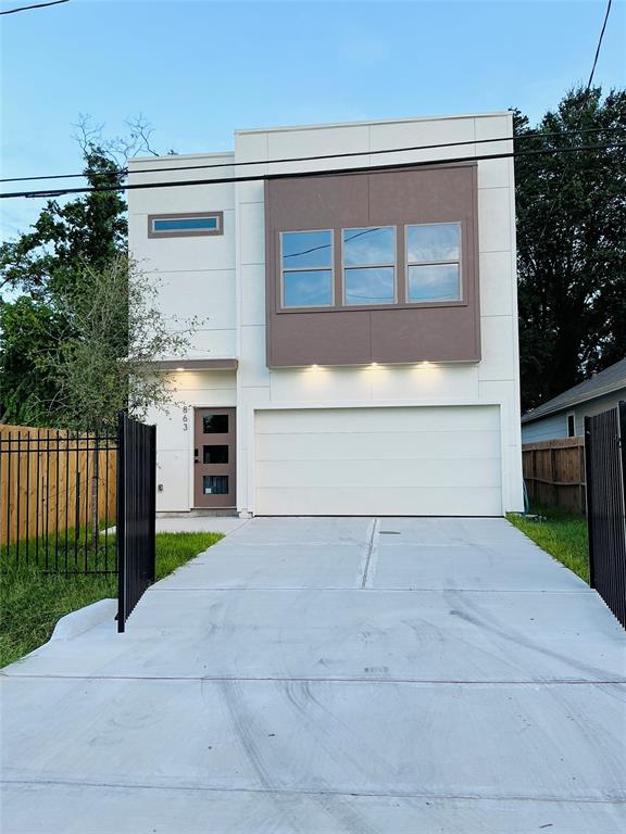 a view of backyard of a house