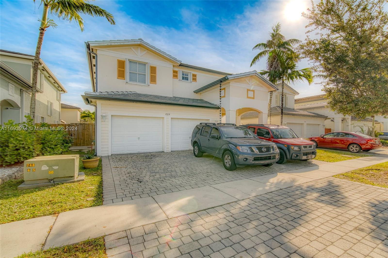 a car parked in front of a house