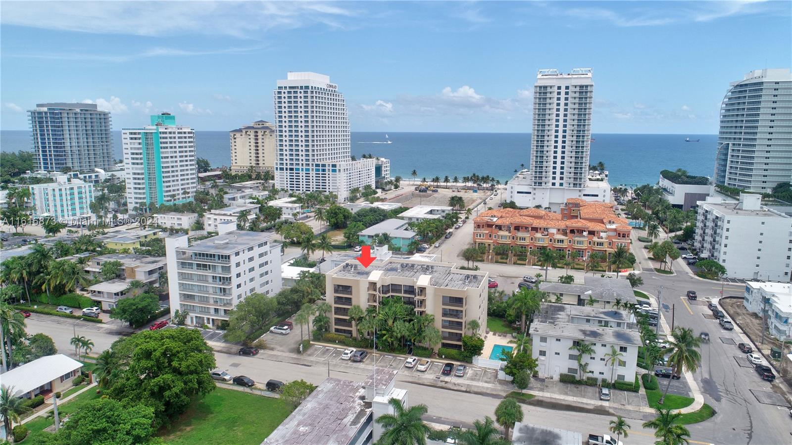 a front view of a city with tall buildings