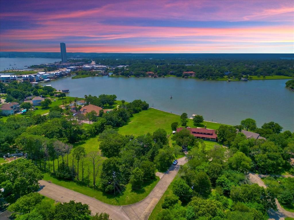 a view of a lake with a city