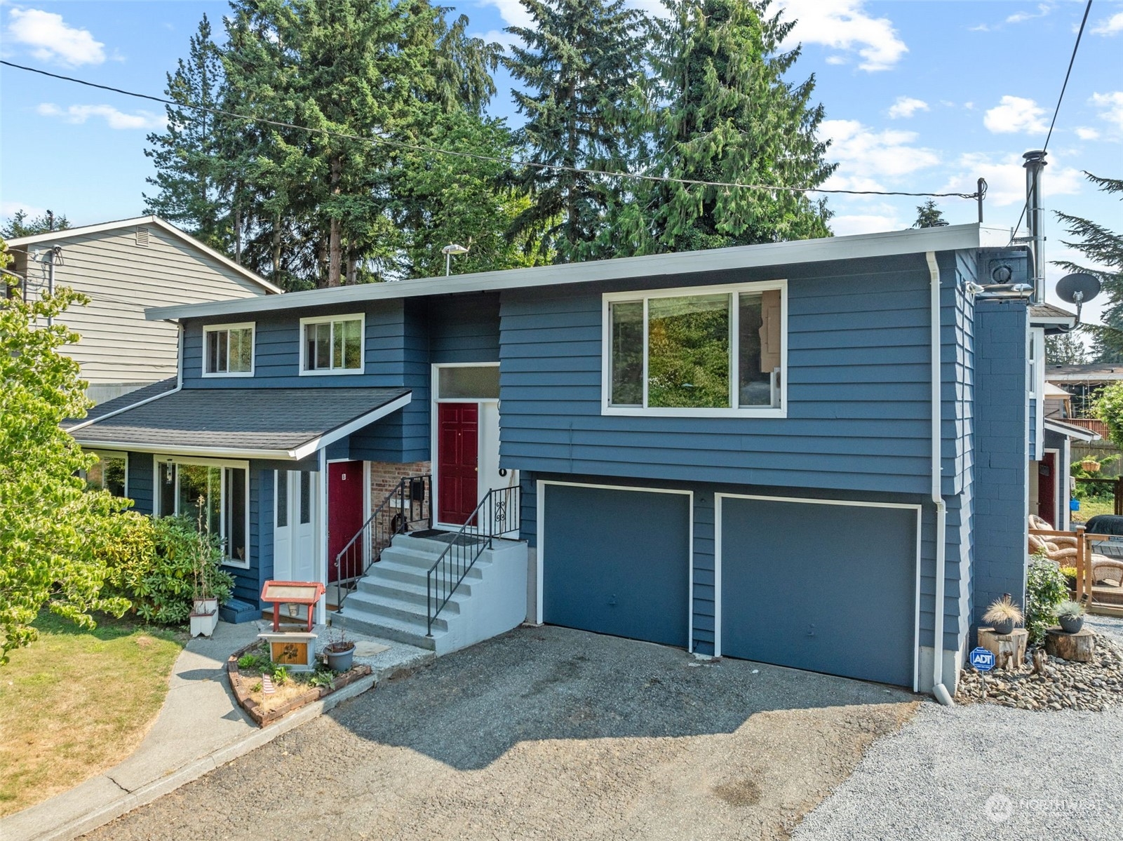 a front view of a house with a garage