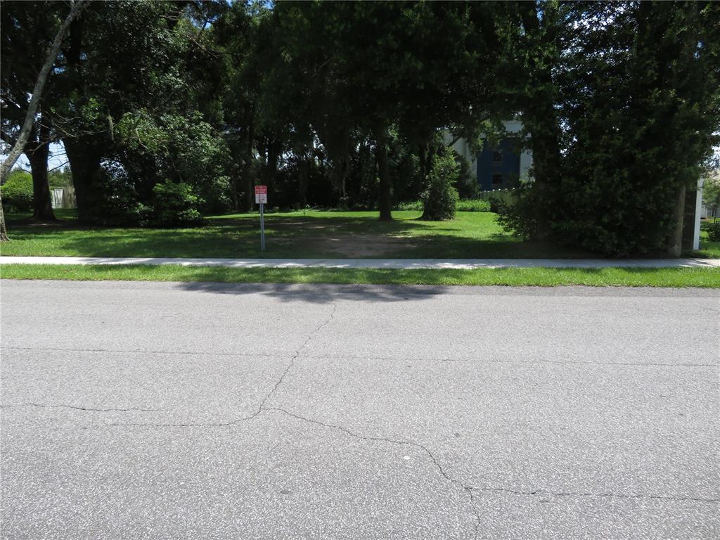 a view of a park and trees