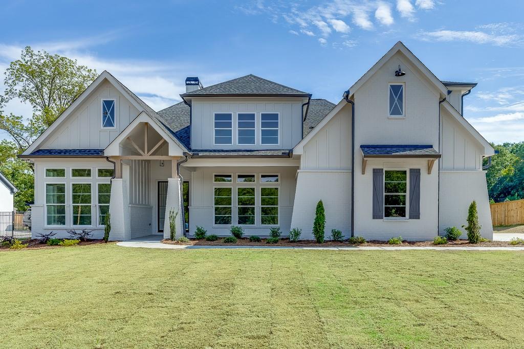 front view of a house with a yard