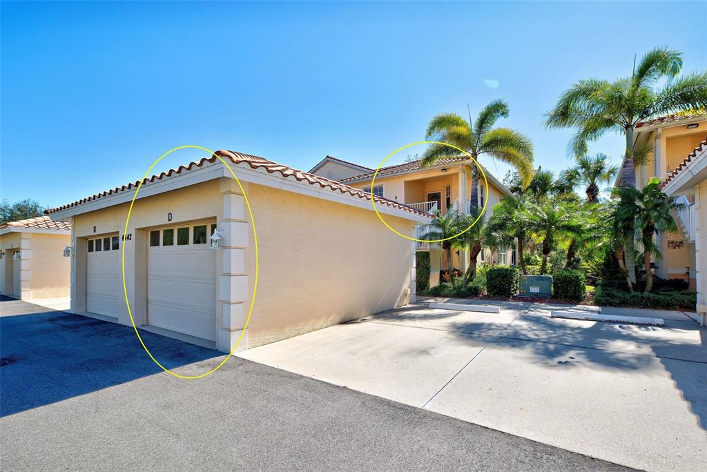 Front view of the condo, including the garage.