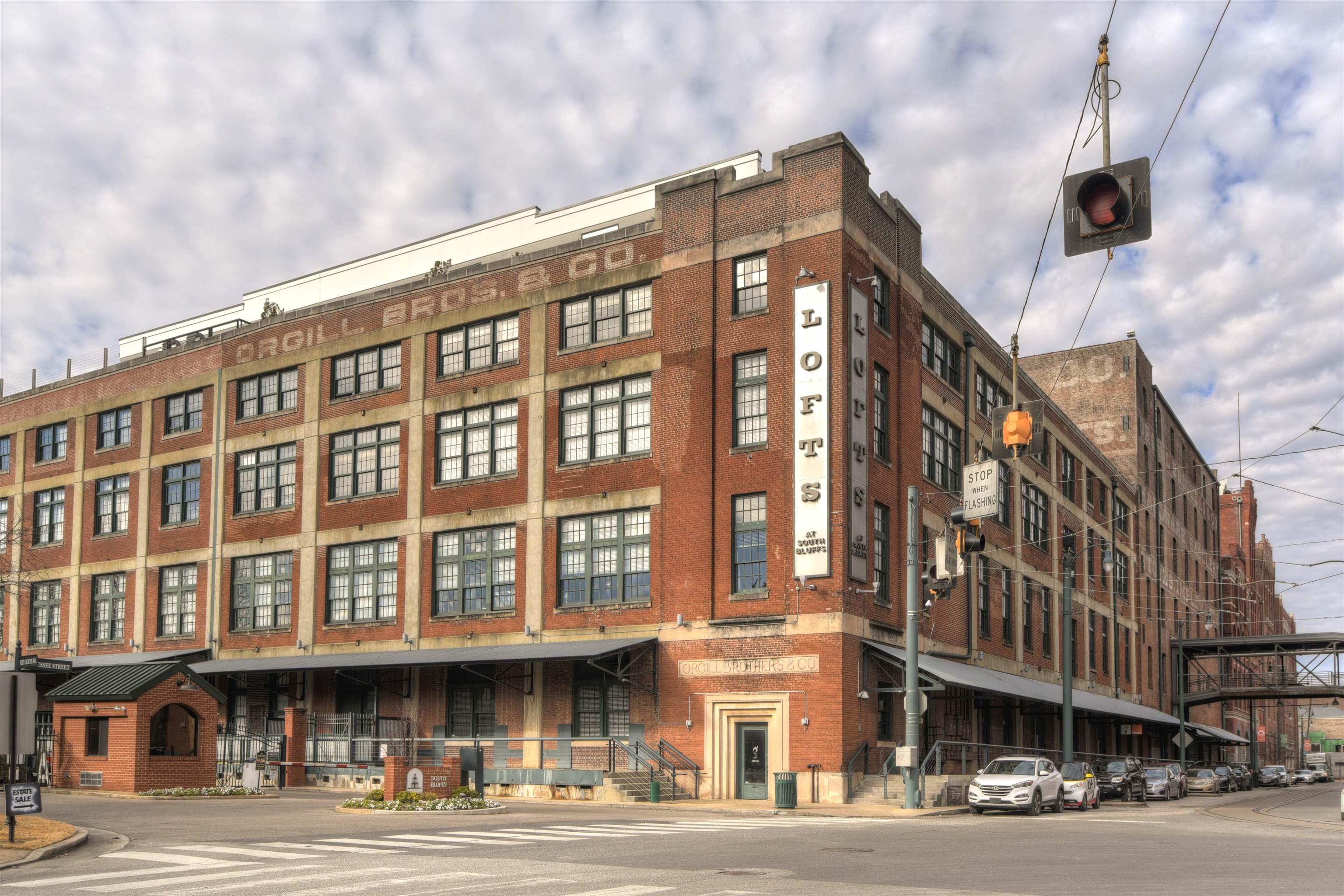 a front view of a building with a street