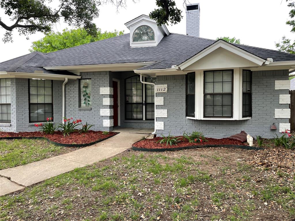 a front view of a house with entertaining space