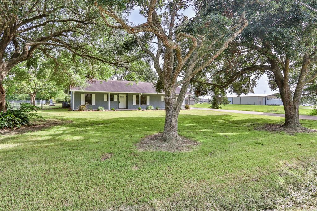 WELCOME TO 12735 4 1/2 ST, SANTA FE.  4 BEDROOM 2 BATH HOME ON OVER AN ACRE OF PROPERTY WITH AN OVERSIZED GARGE THAT HAS A WORKSHOP AND ATTIC FAN.  THE GARAGE HAS STORAGE SPACE UP ABOVE , SO AN ADDED PLUS.LOTS OF SHADE TREES IN THE FRONT AND BACK OF PROPERTY.