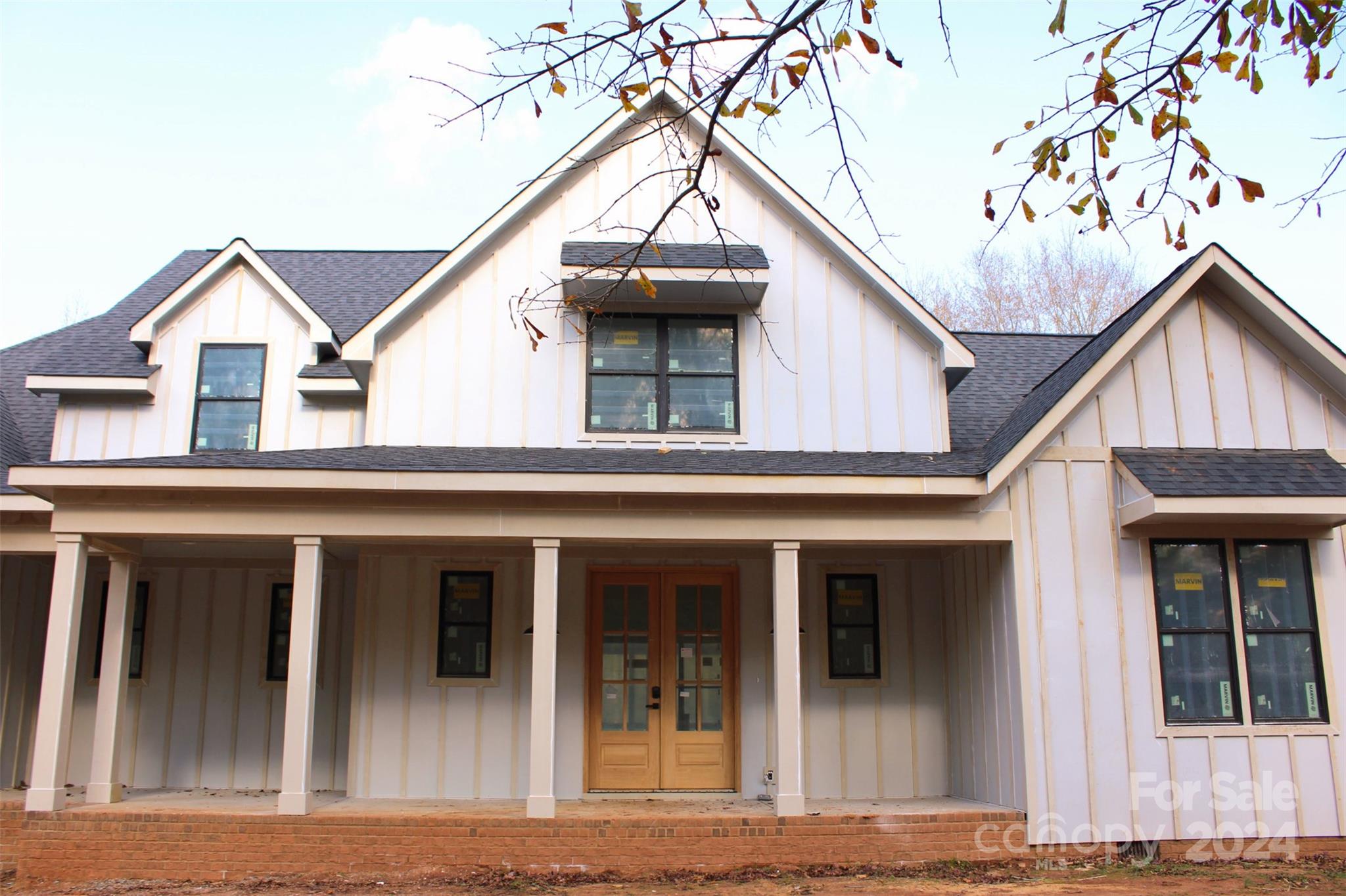 front view of a house with a small yard