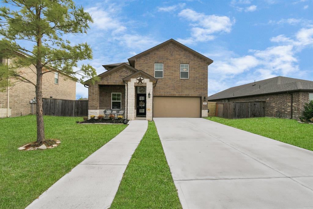 a front view of house with a yard